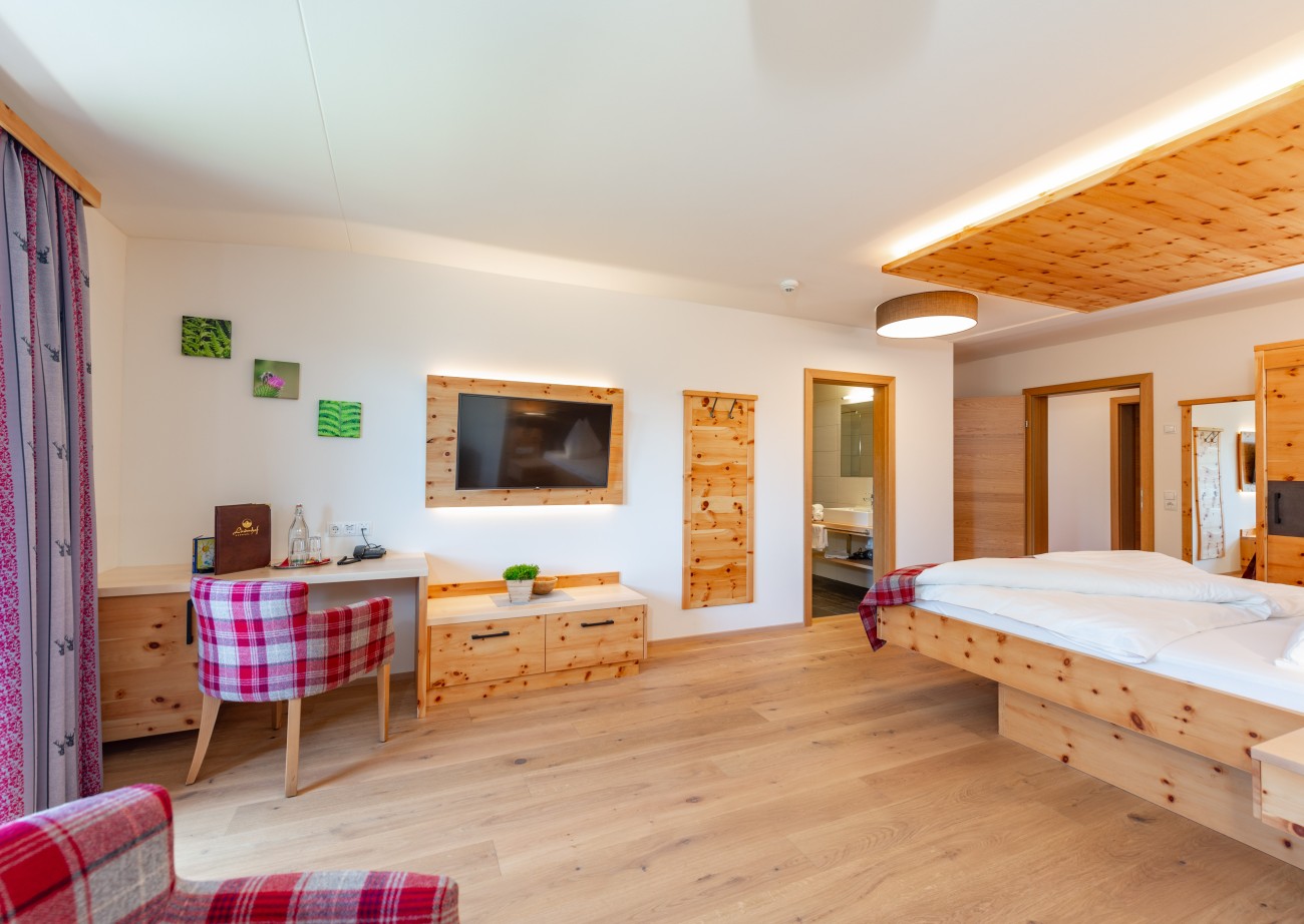 Spacious sleeping area in the Swiss Stone Pine Suite